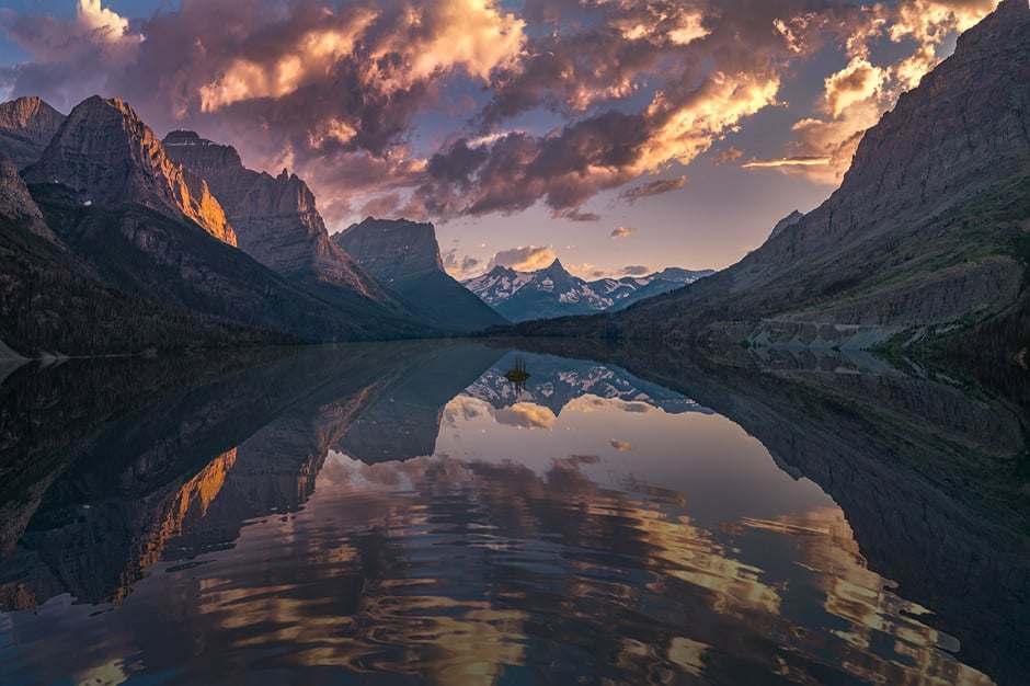 Visit pristine waters and beautiful sunsets at Glacier National Park by train with Amtrak Vacations Lake Mary at Glacier National Park