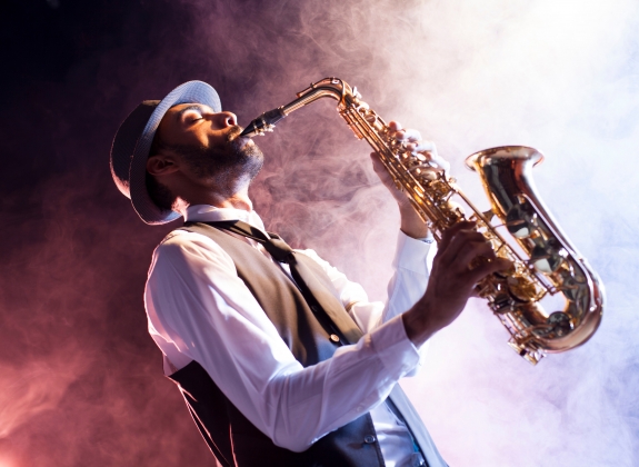 musician playing saxophone. Old style jazz.