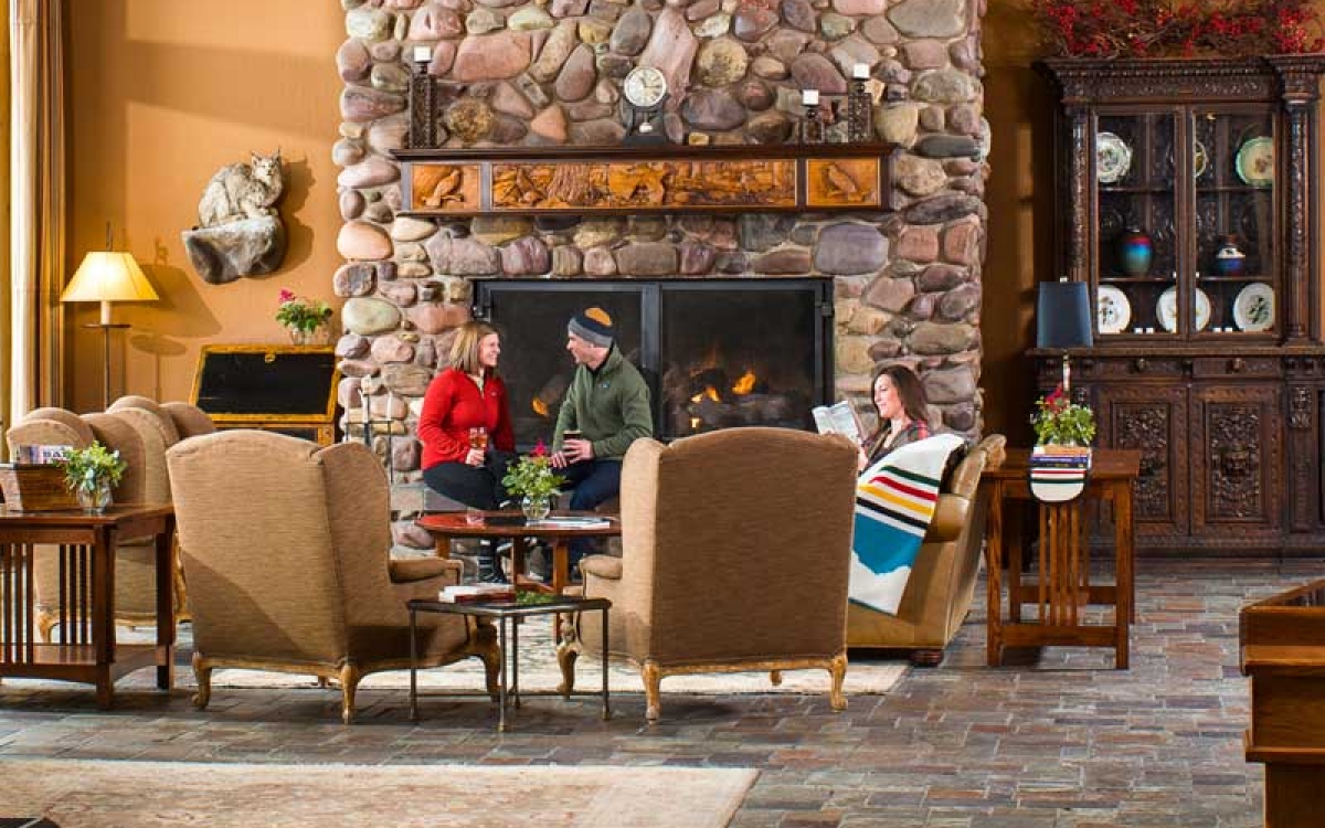 fireplace in lobby at Grouse Mountain Lodge in Whitefish, Montana