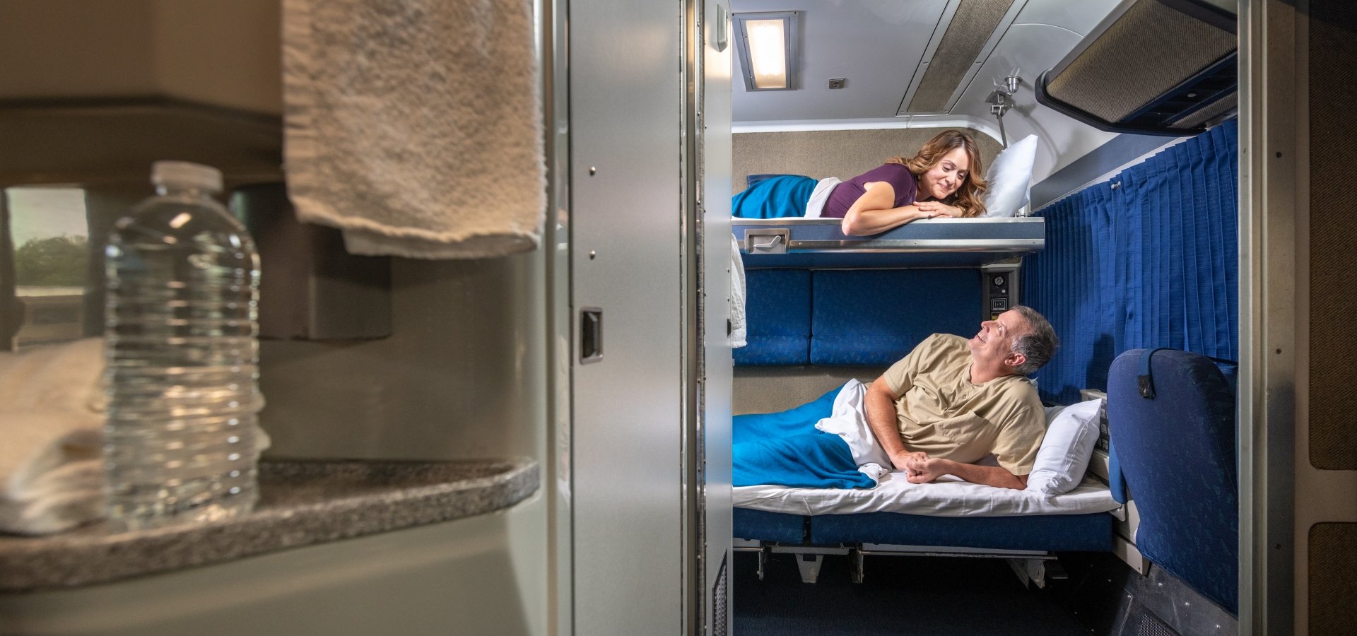couple in amtrak bedroom suite