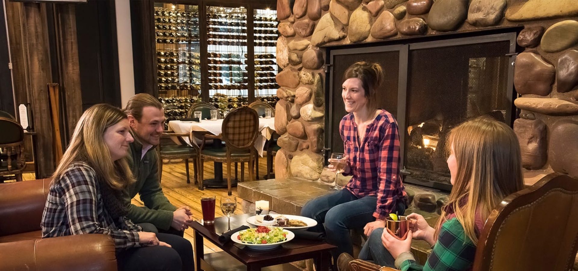people sitting at Logans Bar at Grouse Mountain Lodge in Whitefish, Montana